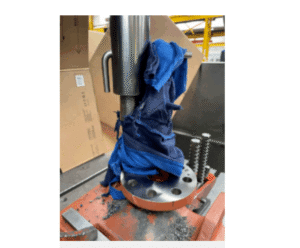 Manufacturing machinery safety audit example showing entanglement risk on a radial-arm drill.